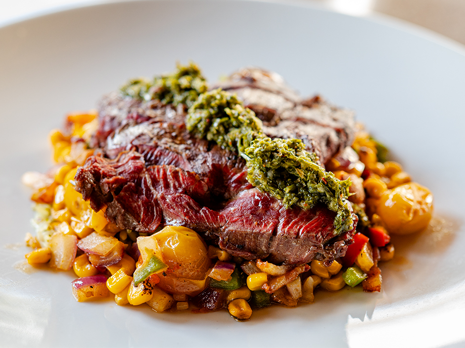 Plate of the new Grilled Angus Beef Churrasco Steak at Confisco Grille in Universal Islands of Adventure.