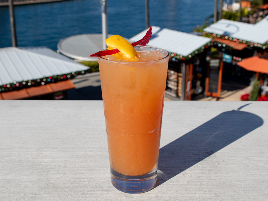 A glass of The Golden Harvest holiday cocktail at Margaritaville in Universal CityWalk for Thanksgiving at Universal Orlando Resort.