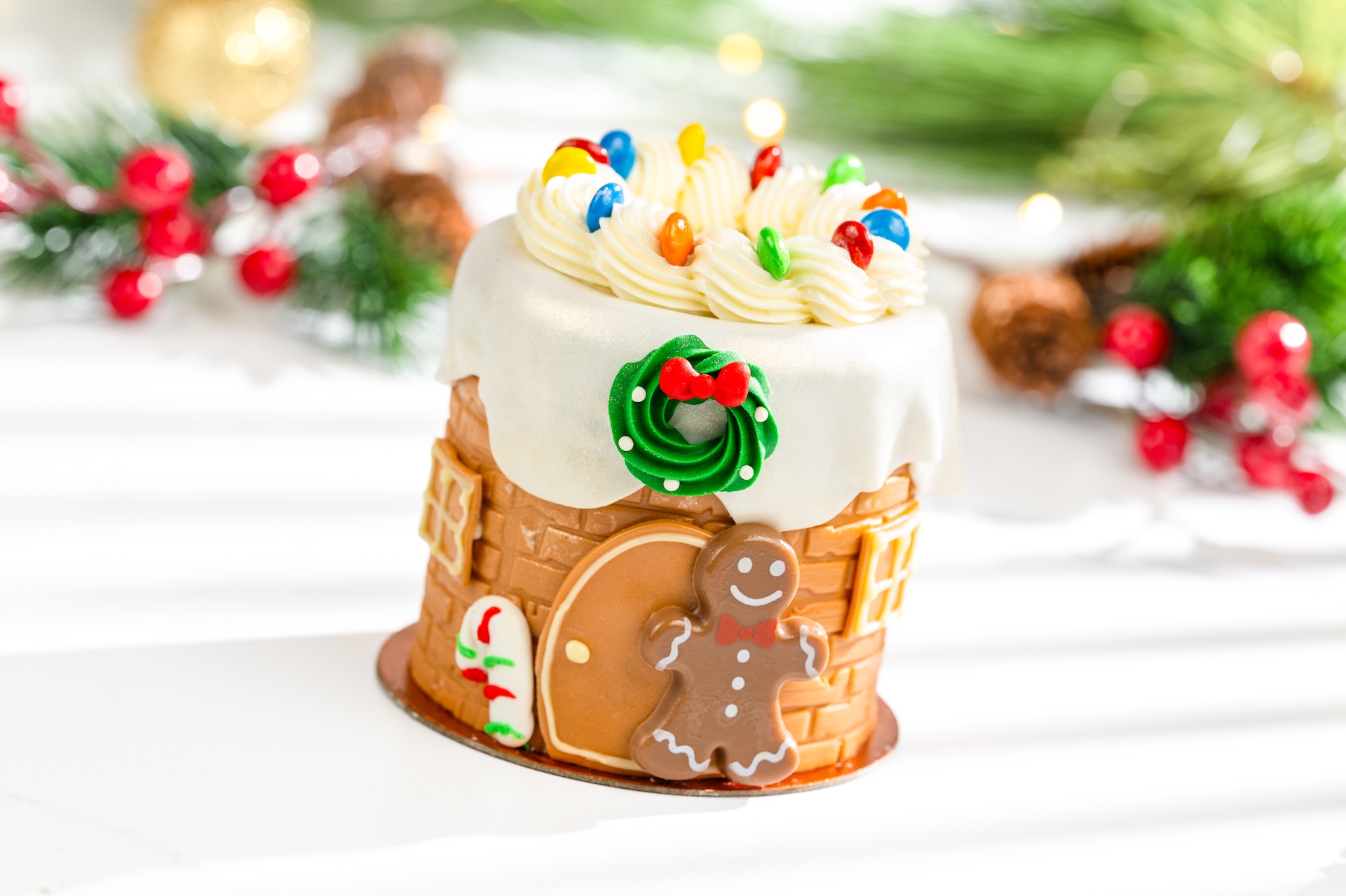 Gingerbread House Petit Cake: Gingerbread chiffon, marshmallow mousse, milk chocolate mousse, salted caramel crispy pearls, and M&M'S Milk Chocolate Minis (New) 