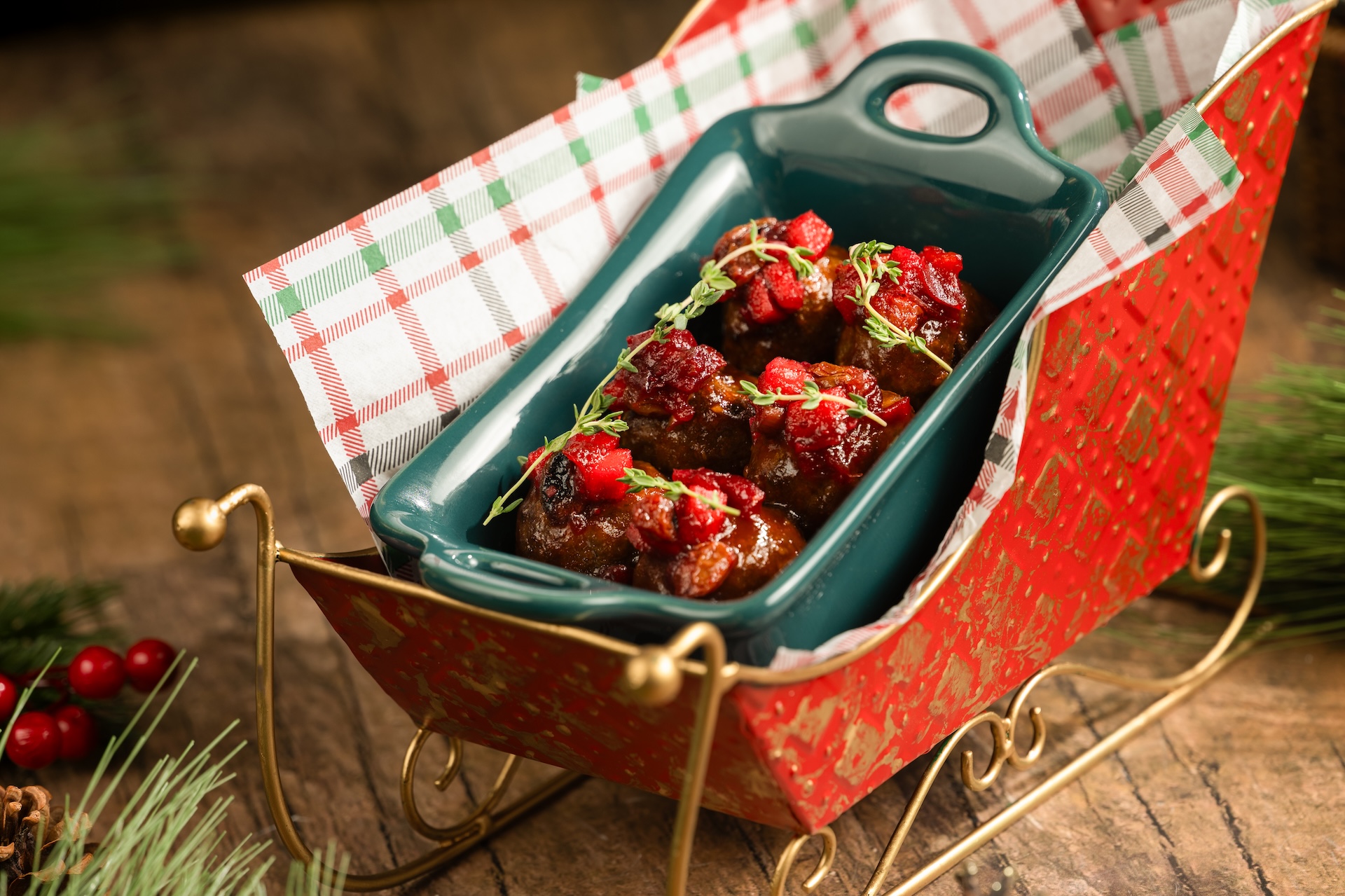 Holiday Mine Car Meatballs: Maple-bourbon meatballs, Granny Smith apple and cranberry chutney, sweet potato hay, and thyme 