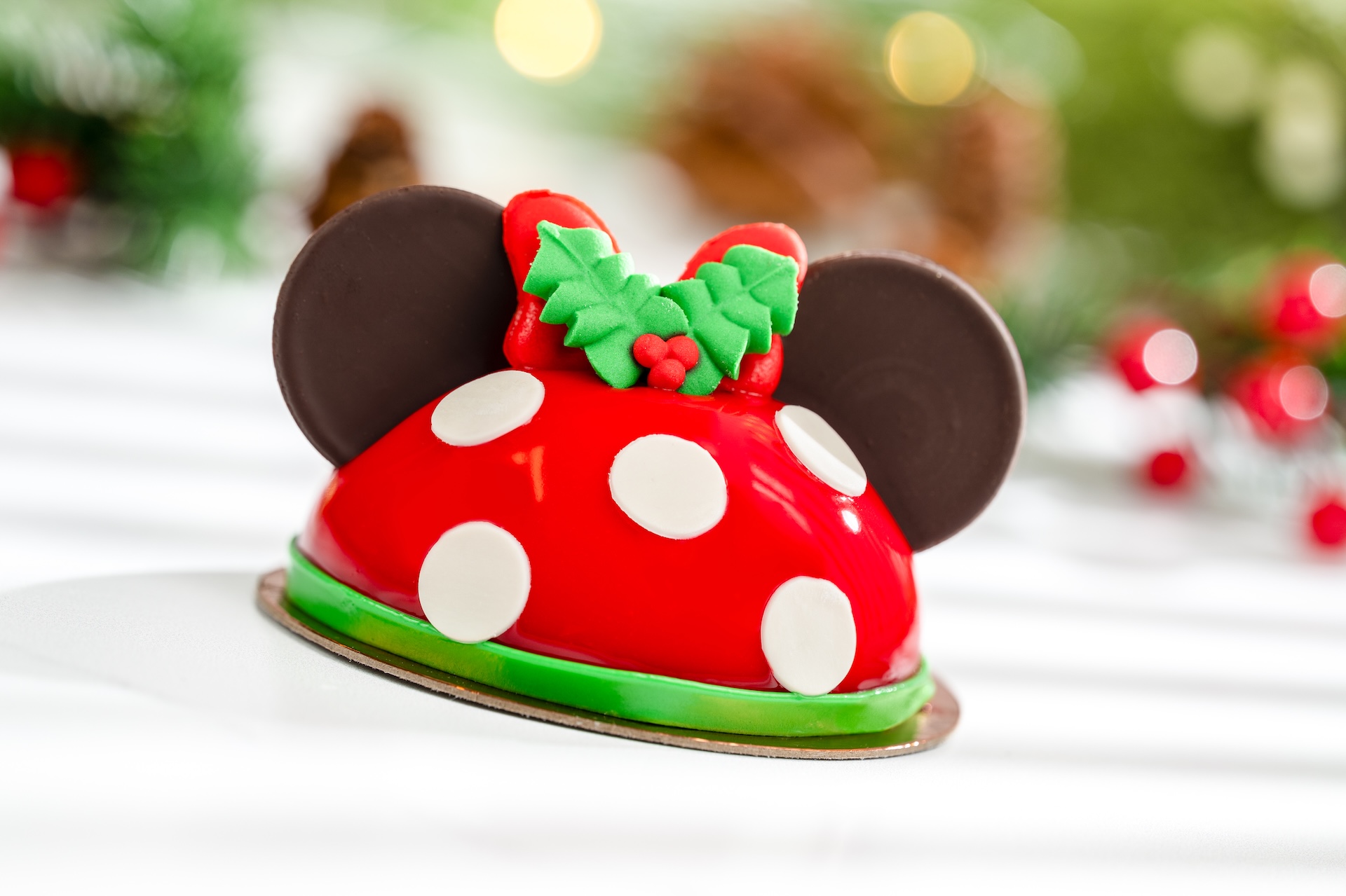 Minnie Petite Dome: White Chocolate mousse, raspberry filling, and vanilla chiffon (New) 