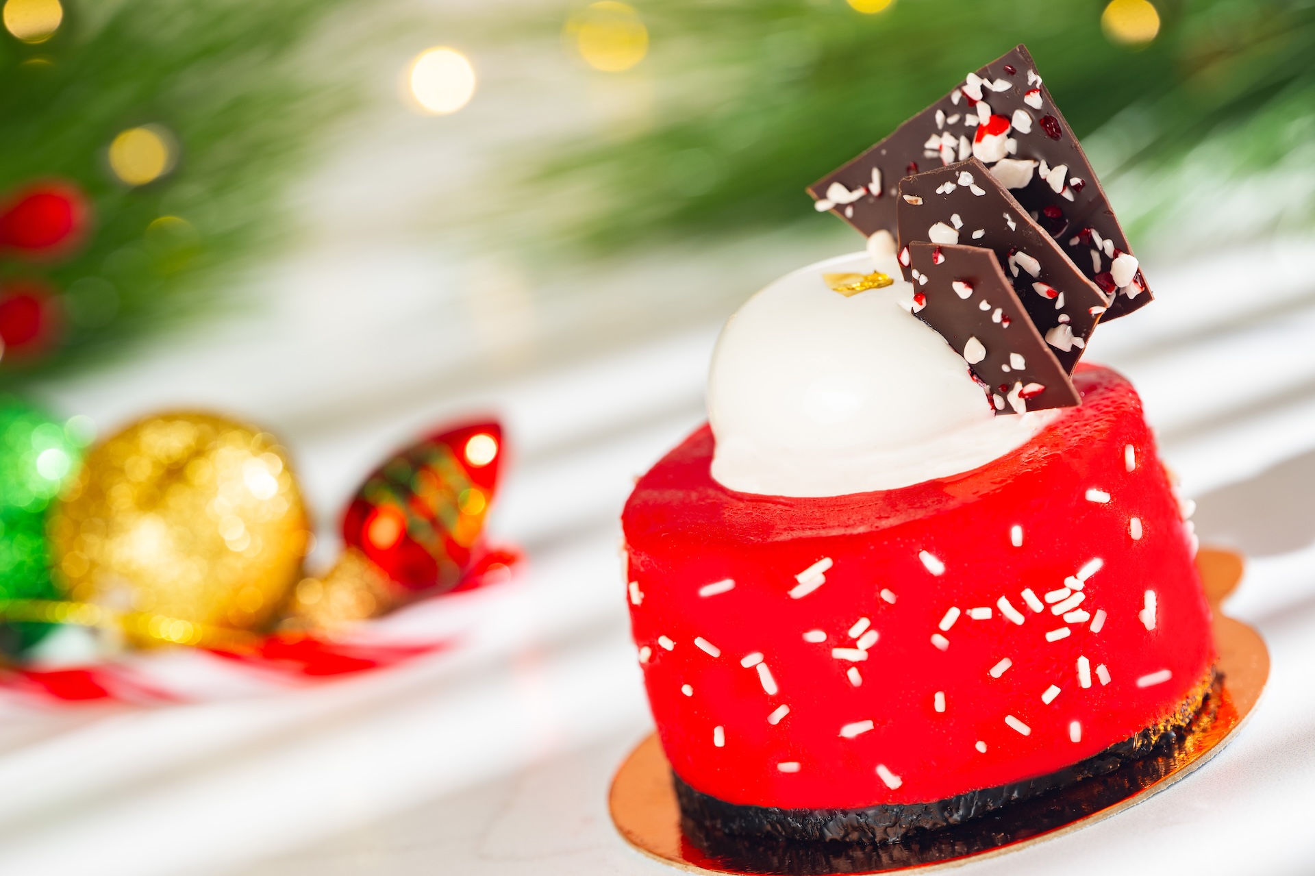 Peppermint Bark Cheesecake: Peppermint cheesecake, chocolate cookie crust, dark chocolate mousse, and dark chocolate-peppermint bark (New) 