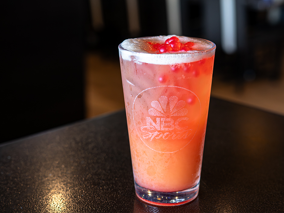 The Strawberry Scuttlebutt mocktail in an NBC Sports branded cup for Veterans and Military Families Appreciation Month.
